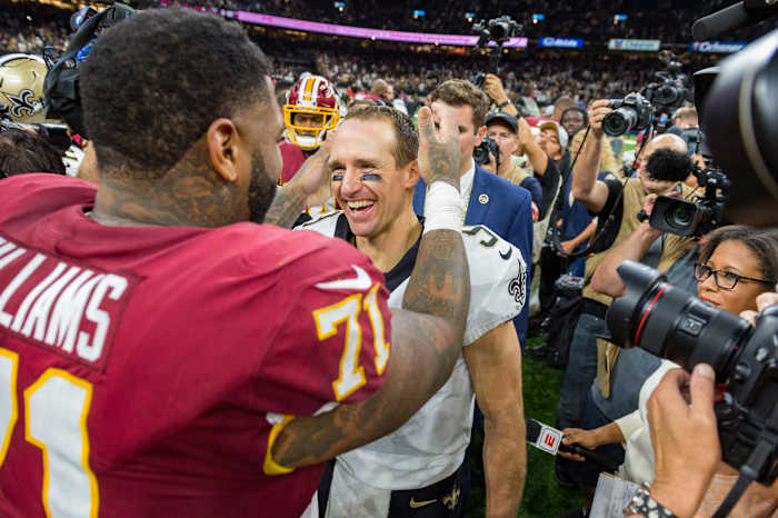 Trent Williams Drew Brees © The Advertiser-USA TODAY NETWORK